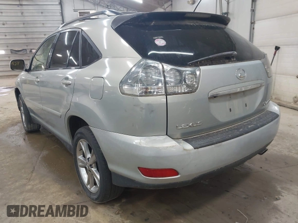 2006 Lexus RX 400h with VIN JTJHW31U760025259, listed as a IAAI auction lot 42743434 with 207,558 mi miles and . Bid and sale history available at DreamBid. Image 3.