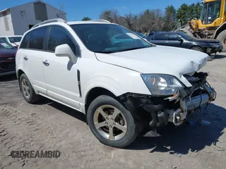 2012 Chevrolet Captiva Sport LTZ z VIN 3GNFL4E57CS641437, wystawiony jako IAAI lot #42045584 z przebiegiem 197 818 mil mil oraz . Historia ofert i sprzedaży dostępna na DreamBid. Obrazek 1.