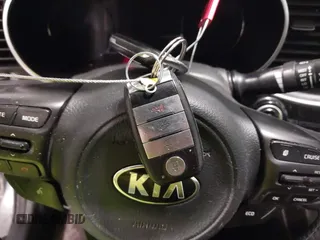 2015 Kia Optima with VIN KNAGM4AD8F5087991, listed as a IAAI auction lot 42286830 with 157,047 mi miles and . Bid and sale history available at DreamBid. Image 11.