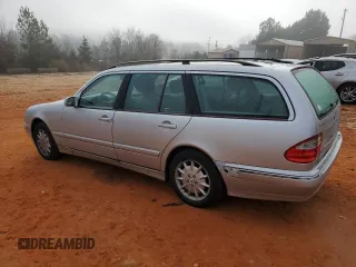 2001 Mercedes-Benz E-Class AWD with VIN WDBJH82J81X048600, listed as a Copart auction lot 85530364 with 172,950 mi miles and Salvage Title. Bid and sale history available at carsss.com. Image 2.