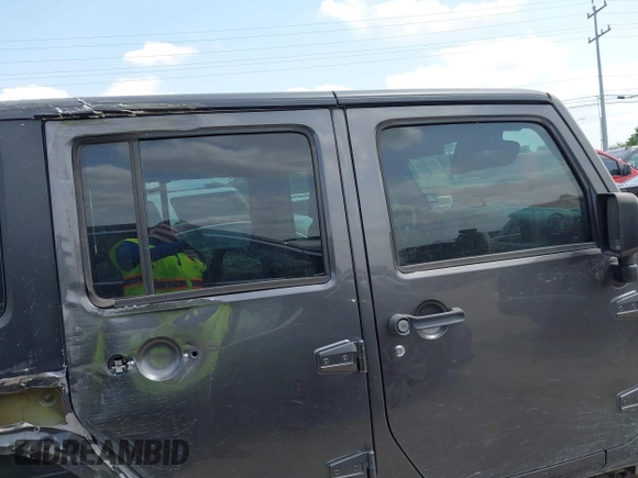 2017 Jeep Wrangler Unlimited Sport with VIN 1C4BJWDG8HL545289, listed as a IAAI auction lot 41978256 with 117,153 mi miles and . Bid and sale history available at DreamBid. Image 13.