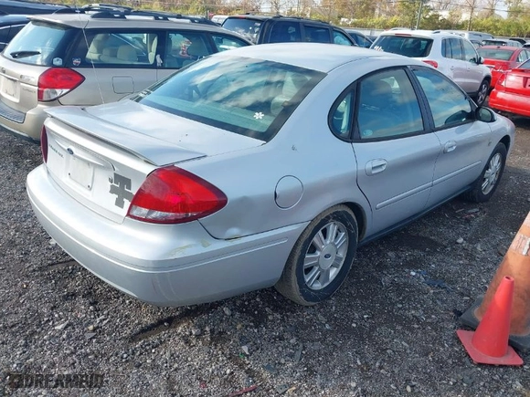 2004 Ford Taurus SEL with VIN 1FAFP56S04A205058, listed as a IAAI auction lot 40796889 with 187,562 mi miles. Bid and sale history available at carsss.com. Image 4.