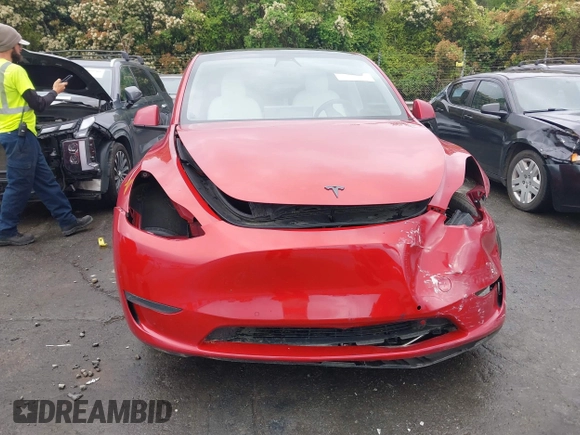 2021 Tesla Model Y Long Range with VIN 5YJYGDEE5MF085032, listed as a IAAI auction lot 41982925 with 64,541 mi miles and . Bid and sale history available at DreamBid. Image 12.