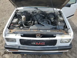 1994 GMC Jimmy Diamond Edition Luxury z VIN 1GKDT13W5R2503916, wystawiony jako Copart lot #54717215 z przebiegiem 99 991 mil mil oraz Szkody całkowita. Historia ofert i sprzedaży dostępna na DreamBid. Obrazek 12.