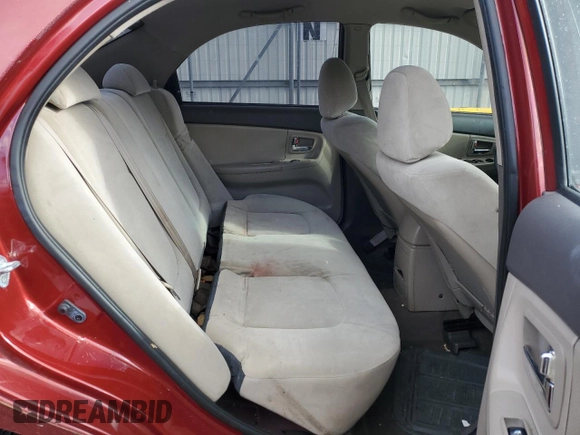 2009 Kia Spectra SX with VIN KNAFE222495661159, listed as a Copart auction lot 42604295 with 123,934 mi miles and Salvage Title. Bid and sale history available at carsss.com. Image 10.