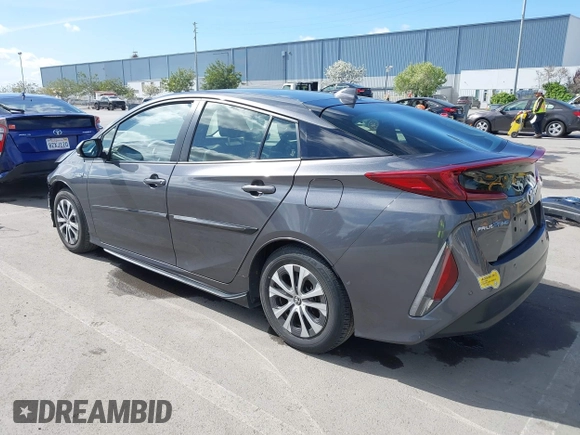 2022 Toyota Prius LE with VIN JTDKAMFP7N3206830, listed as a IAAI auction lot 41984239 with 57,681 mi miles and . Bid and sale history available at DreamBid. Image 3.