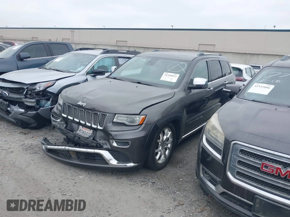 2014 Jeep Grand Cherokee Summit with VIN 1C4RJFJG8EC434899, listed as a IAAI auction lot 42399912 with 186,840 mi miles and . Bid and sale history available at DreamBid. Image 2.