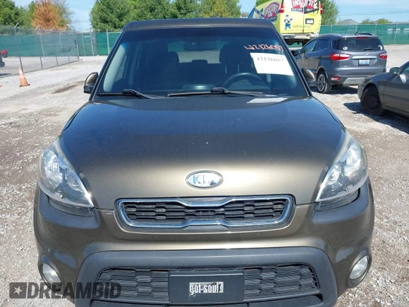 2012 Kia Soul + with VIN KNDJT2A60C7472303, listed as a IAAI auction lot 42126057 with 308,726 mi miles. Bid and sale history available at carsss.com. Image 6.