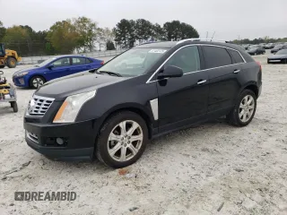 2014 Cadillac SRX Performance Collection with VIN 3GYFNCE39ES544779, listed as a Copart auction lot 51400125 with 160,977 mi miles and Clean Title. Bid and sale history available at carsss.com. Image 1.