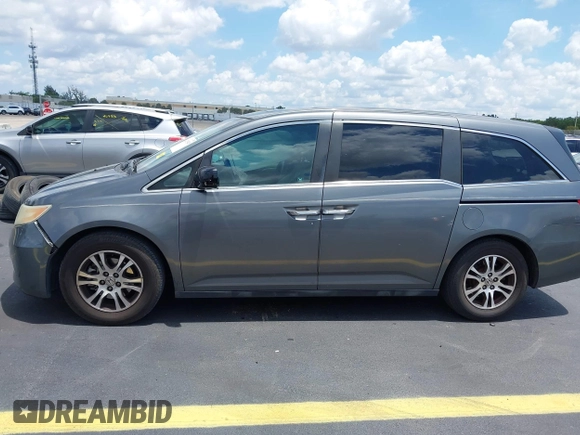 2012 Honda Odyssey EX-L с VIN 5FNRL5H69CB060174, выставлен на аукционе IAAI как лот 42335345 с пробегом 150 457 миль миль и . История ставок и продаж доступна на DreamBid. Изображение 14.