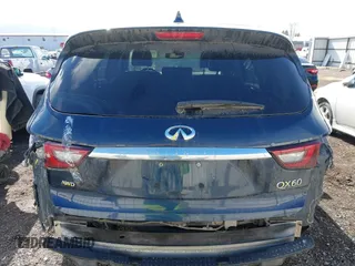 2020 Infiniti QX60 Luxe with VIN 5N1DL0MM0LC530960, listed as a IAAI auction lot 41718329 with 89,446 mi miles and . Bid and sale history available at DreamBid. Image 17.