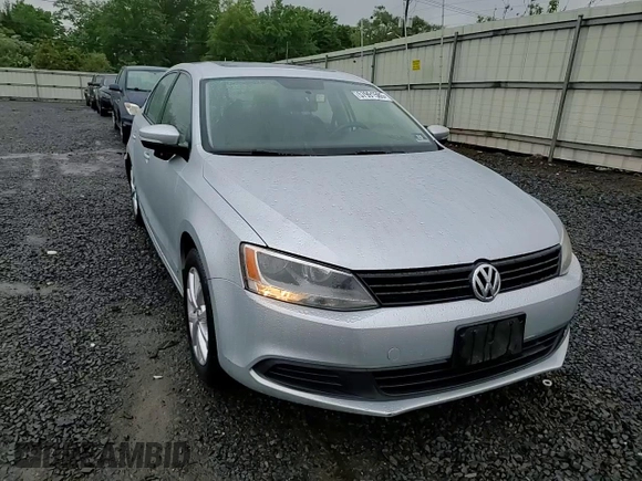 2011 Volkswagen Jetta SE with VIN 3VWDZ7AJ5BM319091, listed as a Copart auction lot 57991585 with 185,458 mi miles and Salvage title. Bid and sale history available at DreamBid. Image 13.