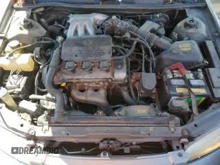 1999 Toyota Camry LE z VIN JT2BF22K4X0202019, wystawiony jako Copart lot #56104335 z przebiegiem 192 643 mil mil oraz Tytuł czysty. Historia ofert i sprzedaży dostępna na DreamBid. Obrazek 11.