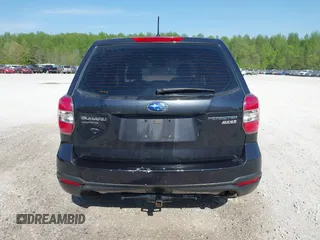 2014 Subaru Forester 2.5i with VIN JF2SJAAC0EH477090, listed as a IAAI auction lot 42080193 with 277,527 mi miles and . Bid and sale history available at DreamBid. Image 16.
