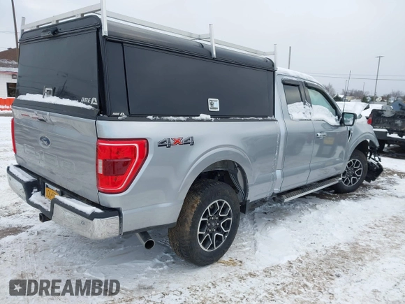 2021 Ford F-150 XL with VIN 1FTFX1E54MFC43510, listed as a IAAI auction lot 41251459 with 15,391 mi miles and . Bid and sale history available at DreamBid. Image 4.