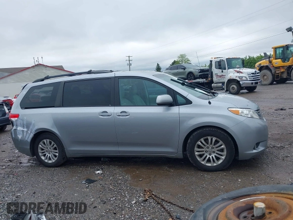 2012 Toyota Sienna XLE AAS with VIN 5TDYK3DC2CS205856, listed as a IAAI auction lot 42230009 with 136,588 mi miles and . Bid and sale history available at DreamBid. Image 13.