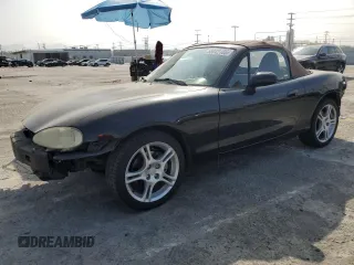 2004 Mazda MX-5 Miata LS with VIN JM1NB353340400080, listed as a Copart auction lot 58042185 with 91,087 mi miles and Salvage title. Bid and sale history available at DreamBid. Image 1.