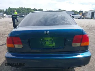 1997 Honda Civic LX z VIN 2HGEJ6671VH574878, wystawiony jako IAAI lot #42332735 z przebiegiem 246 181 mil mil oraz . Historia ofert i sprzedaży dostępna na DreamBid. Obrazek 16.