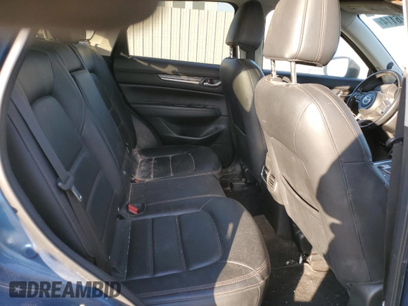 2020 Mazda CX-5 Grand Touring with VIN JM3KFBDM1L0727482, listed as a Copart auction lot 82976114 with 103,707 mi miles and Salvage Title. Bid and sale history available at carsss.com. Image 11.