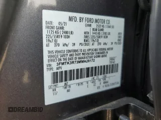 2021 Ford Mustang Mach-E Premium z VIN 3FMTK3R73MMA28172, wystawiony jako Copart lot #41907515 z przebiegiem 12 518 mil mil oraz Szkoda całkowita • Salvage title. Historia ofert i sprzedaży dostępna na DreamBid. Obrazek 16.