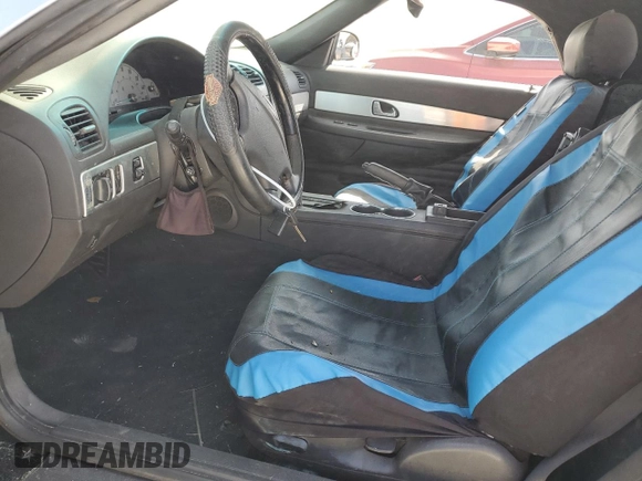 2002 Ford Thunderbird Hardtop Premium with VIN 1FAHP60A12Y120989, listed as a Copart auction lot 77573084 with Not Provided miles and Salvage Title. Bid and sale history available at DreamBid. Image 7.
