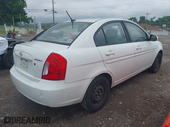 2011 Hyundai Accent GLS z VIN KMHCN4AC7BU609303, wystawiony jako IAAI lot #42523271 z przebiegiem 157 830 mil mil oraz . Historia ofert i sprzedaży dostępna na DreamBid. Obrazek 4.