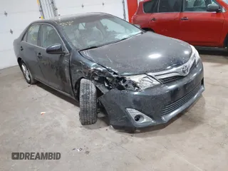 2014 Toyota Camry L with VIN 4T4BF1FKXER419576, listed as a IAAI auction lot 41783777 with 185,799 mi miles. Bid and sale history available at carsss.com. Image 1.