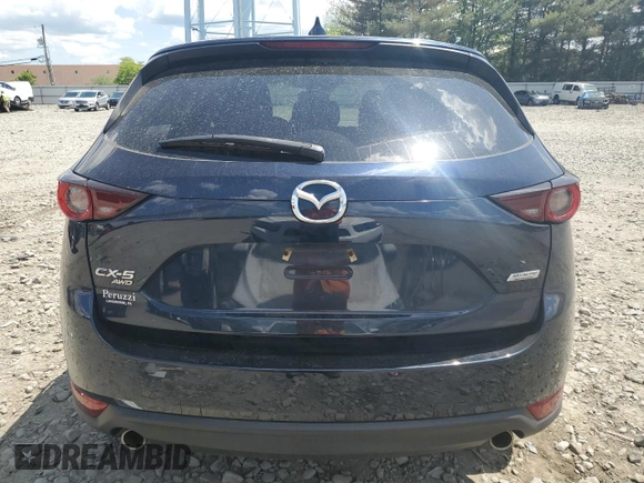 2018 Mazda CX-5 Touring with VIN JM3KFBCMXJ0460020, listed as a Copart auction lot 55997305 with 56,361 mi miles and Salvage Title. Bid and sale history available at DreamBid. Image 6.