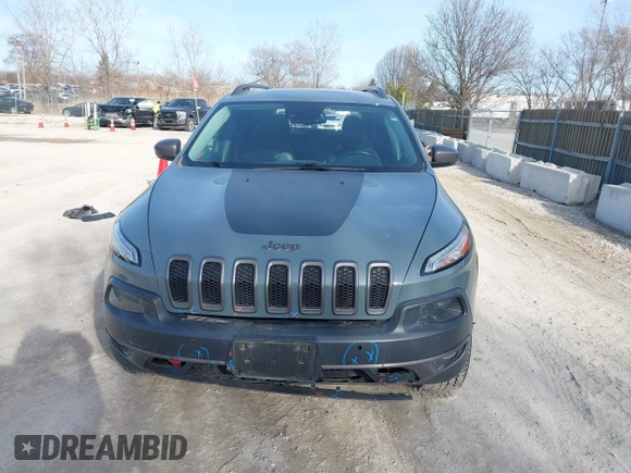 2014 Jeep Cherokee Trailhawk z VIN 1C4PJMBS5EW147579, wystawiony jako IAAI lot #41781543 z przebiegiem 155 751 mil mil oraz . Historia ofert i sprzedaży dostępna na DreamBid. Obrazek 13.