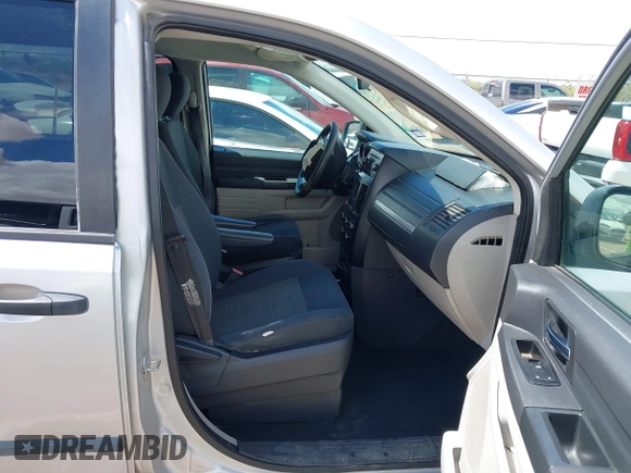2008 Dodge Grand Caravan SE with VIN 2D8HN44H78R667145, listed as a IAAI auction lot 42654330 with 230,966 mi miles and . Bid and sale history available at DreamBid. Image 5.