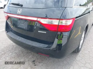 2012 Honda Odyssey Touring with VIN 5FNRL5H93CB121190, listed as a IAAI auction lot 42223998 with 154,358 mi miles and . Bid and sale history available at DreamBid. Image 6.