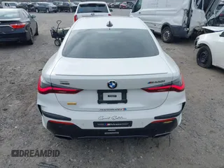 2021 BMW 4 Series M440i xDrive with VIN WBA13AR06MCF78418, listed as a IAAI auction lot 41257716 with 35,974 mi miles and . Bid and sale history available at carsss.com. Image 16.