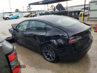 2022 Tesla Model 3 with VIN 5YJ3E1EA6NF188263, listed as a Copart auction lot 77542203 with 75,461 mi miles and Non Repairable. Bid and sale history available at DreamBid. Image 2.