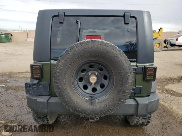 2007 Jeep Wrangler Unlimited X z VIN 1J4GA39197L181305, wystawiony jako Copart lot #45928555 z przebiegiem Nie podano mil oraz Szkoda całkowita • Salvage title. Historia ofert i sprzedaży dostępna na DreamBid. Obrazek 6.