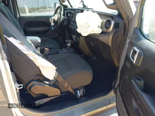2020 Jeep Wrangler Sport S with VIN 1C4GJXAN5LW146068, listed as a IAAI auction lot 42071619 with 51,238 mi miles and . Bid and sale history available at DreamBid. Image 5.