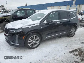 2021 Cadillac XT6 Premium Luxury with VIN 1GYKPDRS3MZ165049, listed as a Copart auction lot 45456145 with 57,112 mi miles and Salvage Title. Bid and sale history available at carsss.com. Image 1.