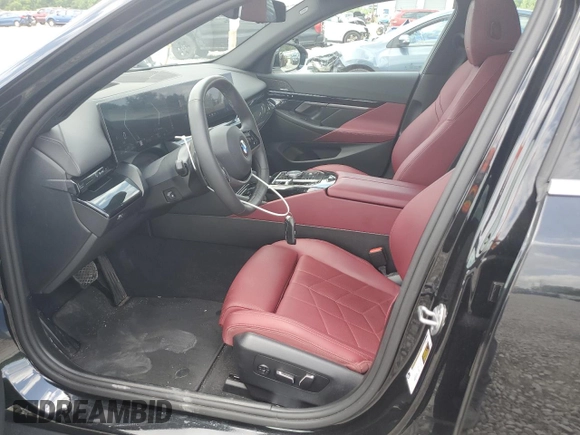 2024 BMW 5 Series 530i with VIN WBA43FJ09RCR05243, listed as a Copart auction lot 61690705 with 34,450 mi miles and Salvage title. Bid and sale history available at DreamBid. Image 7.