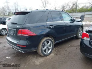 2018 Mercedes-Benz GLE with VIN 4JGDA5HB8JB122110, listed as a IAAI auction lot 42018295 with 153,624 mi miles. Bid and sale history available at carsss.com. Image 4.