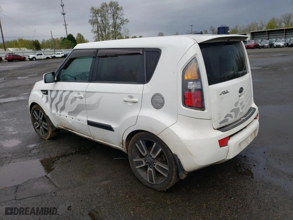 2011 Kia Soul + with VIN KNDJT2A21B7262871, listed as a Copart auction lot 52214145 with 239,808 mi miles and Clean Title. Bid and sale history available at carsss.com. Image 2.