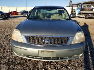 2005 Ford Five Hundred SEL with VIN 1FAHP27195G124300, listed as a Copart auction lot 80948394 with 141,765 mi miles and Salvage Title. Bid and sale history available at carsss.com. Image 5.