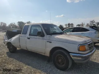 1994 Ford Ranger Splash with VIN 1FTCR14UXRTA90856, listed as a Copart auction lot 76409694 with 216,587 mi miles and Salvage Title. Bid and sale history available at carsss.com. Image 4.