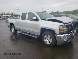 2018 Chevrolet Silverado 1500 LT with VIN 1GCVKREH8JZ102484, listed as a Copart auction lot 55114225 with 59,185 mi miles and Salvage Title. Bid and sale history available at DreamBid. Image 4.