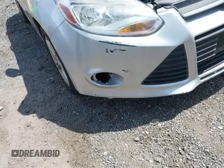 2013 Ford Focus SE with VIN 1FADP3F28DL307076, listed as a IAAI auction lot 42098620 with 182,555 mi miles. Bid and sale history available at carsss.com. Image 6.