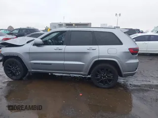 2021 Jeep Grand Cherokee Laredo E with VIN 1C4RJEAG6MC713910, listed as a IAAI auction lot 41041400 with 69,242 mi miles and . Bid and sale history available at DreamBid. Image 14.
