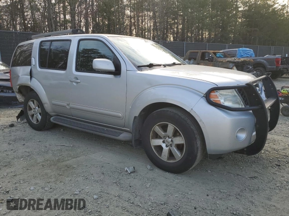 2011 Nissan Pathfinder LE z VIN 5N1AR1NB9BC622216, wystawiony jako Copart lot #50029145 z przebiegiem 150 896 mil mil oraz Szkoda całkowita • Salvage title. Historia ofert i sprzedaży dostępna na DreamBid. Obrazek 4.