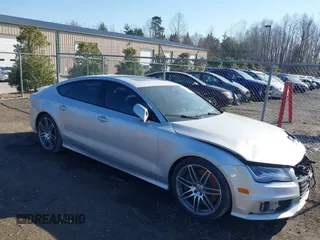 2014 Audi S7 Prestige with VIN WAUW2AFC6EN140766, listed as a IAAI auction lot 41780769 with 101,318 mi miles. Bid and sale history available at carsss.com. Image 1.