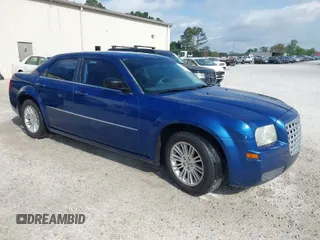 2009 Chrysler 300 LX with VIN 2C3KA43D69H614978, listed as a IAAI auction lot 41966879 with 247,871 mi miles. Bid and sale history available at carsss.com. Image 1.