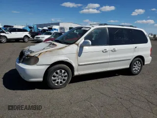 2004 Kia Sedona LX with VIN KNDUP131946538819, listed as a Copart auction lot 50098514 with 0 mi miles and Salvage Title. Bid and sale history available at carsss.com. Image 1.