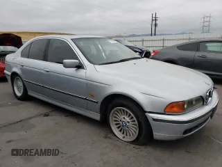 1997 BMW 5 Series 540iA with VIN WBADE6327VBW53064, listed as a Copart auction lot 77033604 with 0 mi miles and Salvage Title. Bid and sale history available at carsss.com. Image 4.