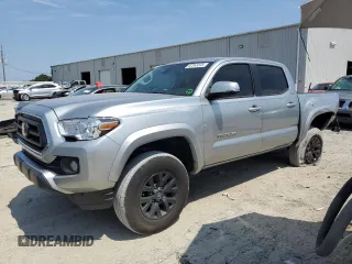 2023 Toyota Tacoma SR with VIN 3TMCZ5AN7PM623990, listed as a Copart auction lot 62343335 with 28,924 mi miles and Salvage title. Bid and sale history available at DreamBid. Image 1.